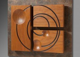 Craig Kassan, Woodworker in Franklinton, NC turns wood to create wall sculptures, hollow forms, burl dishes and natural edge hollow spheres.