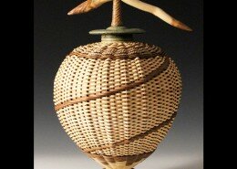 Stephen Kostyshyn Mixed Media Artist in Cedar, MI hand assembles and weaves his red osier, birch bark and palm pieces with wheel thrown and altered clay.
