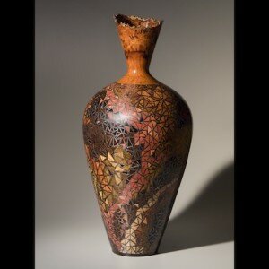 James Barnes, woodworker in Woolwine, Virginia, creates turned wood vessels with inlay and metal to design original, one-of-a-kind wood cloisonné sculpture.