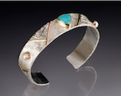 Mary Timmer, jeweler in Asheville, NC, creates elegant hand crafted rings, earrings and bracelets using sterling silver, gold, pearls and precious stones.