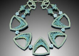 Kathy King, jeweler in Cary, NC, creates intricate beaded necklaces, bracelets and earrings inspired by architecture and colors from around the world.
