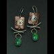 Maggie Joynt, Jeweler in NC, creates necklaces, earrings and bracelets with texture and movement using sterling silver, copper, brass and mixed gemstones.