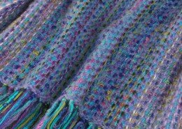 Carol Clay and Mac Chambers, fiber artists in Greensboro, NC create colorful handwoven mohair or 100% organic cotton throws and scarves inspired by nature.