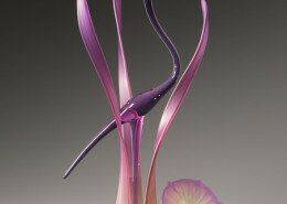 Warner Whitfield, Glass Artist, meticulously designs and creates each timeless piece with elements of fire and glass; works of art inspired by nature.