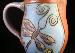 Jennifer Stas Potter from NC creates functional pottery with a beautiful aesthetic through distinctive yet balanced use of color, carving and form.