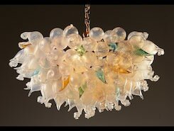 Sam Stark, glass artist in Asheville, NC, creates colorful functional glass, custom lighting and sculptural art glass inspired by the sea. 
